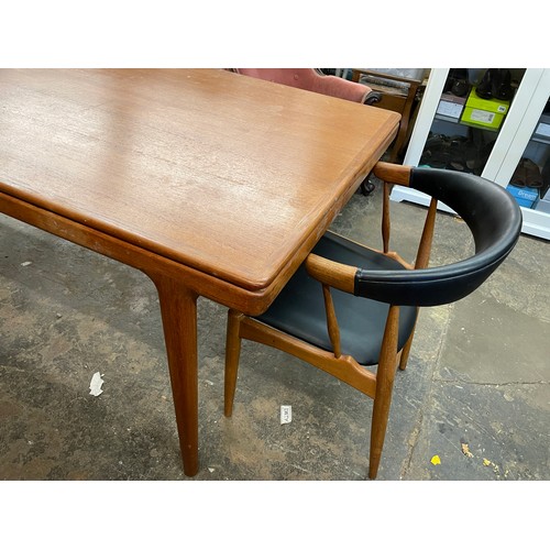 137 - 1960S DANISH TEAK EXTENDING DINING TABLE AND FOUR ARMCHAIRS DESIGNED BY JOHANNES ANDERSEN FOR BRDR. ... 