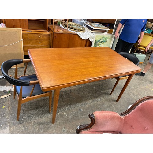 137 - 1960S DANISH TEAK EXTENDING DINING TABLE AND FOUR ARMCHAIRS DESIGNED BY JOHANNES ANDERSEN FOR BRDR. ... 