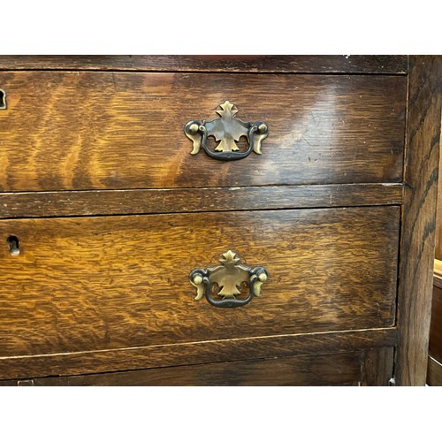 126 - OAK TWO DRAWER CHEST CUPBOARD