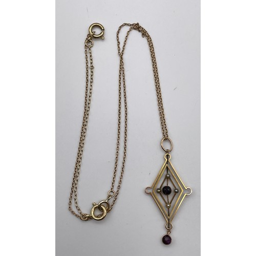 461 - UNMARKED ART DECO LOZENGE AMETHYST AND SEED PEARL PENDANT ON A 9CT GOLD TRACE CHAIN 4.6G OVERALL APP... 