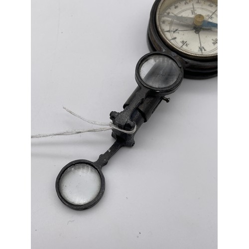 323 - ANTIQUE POCKET COMPASS WITH MIRRORED MAGNIFIER 9cm