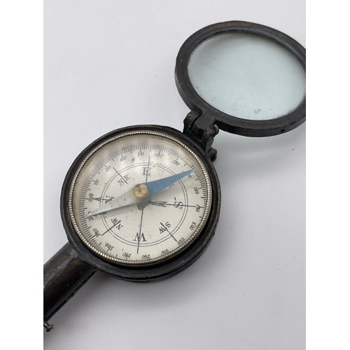 323 - ANTIQUE POCKET COMPASS WITH MIRRORED MAGNIFIER 9cm