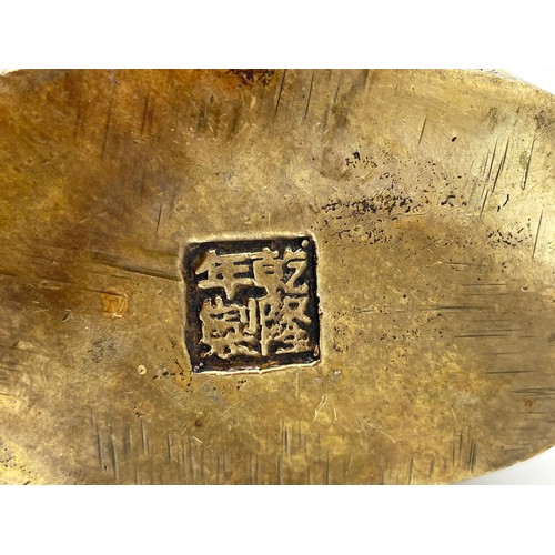 340 - CHINESE BRONZE LOBED POT DECORATED WITH FIGURES AND DRAGONS SCRIPT MARK TO UNDERSIDE 9cm x 8cm