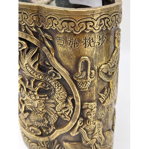 340 - CHINESE BRONZE LOBED POT DECORATED WITH FIGURES AND DRAGONS SCRIPT MARK TO UNDERSIDE 9cm x 8cm