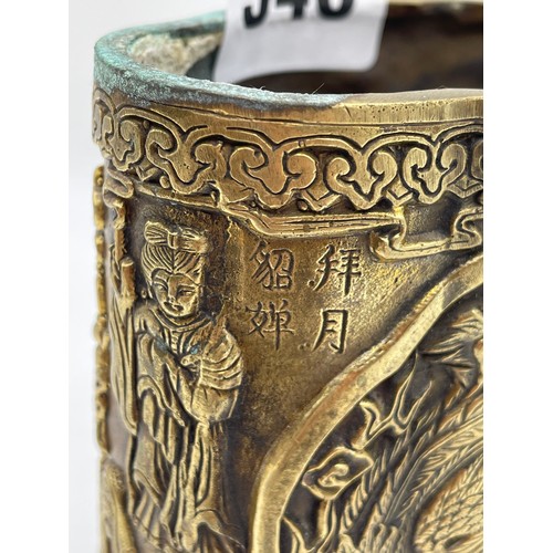 340 - CHINESE BRONZE LOBED POT DECORATED WITH FIGURES AND DRAGONS SCRIPT MARK TO UNDERSIDE 9cm x 8cm