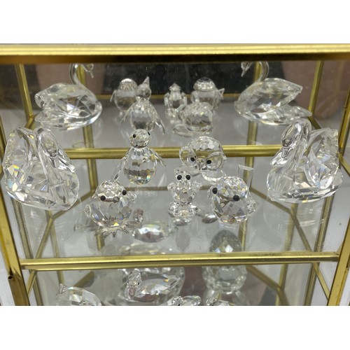 306 - THREE TIER GLAZED CASE OF SWAROVSKI CRYSTAL BIRD FIGURES