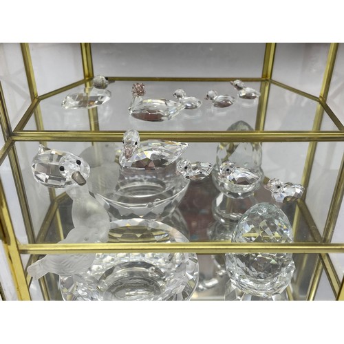 306 - THREE TIER GLAZED CASE OF SWAROVSKI CRYSTAL BIRD FIGURES