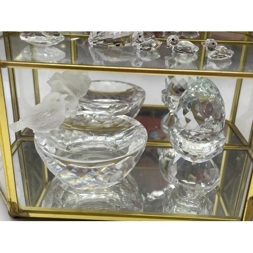 306 - THREE TIER GLAZED CASE OF SWAROVSKI CRYSTAL BIRD FIGURES