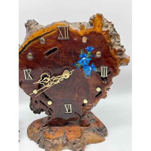 336 - TWO WESTERN AUSTRALIA MALLEE WOOD HAND PAINTED BATTERY OPERATED CLOCKS SIGNED BT 30cm x 20cm