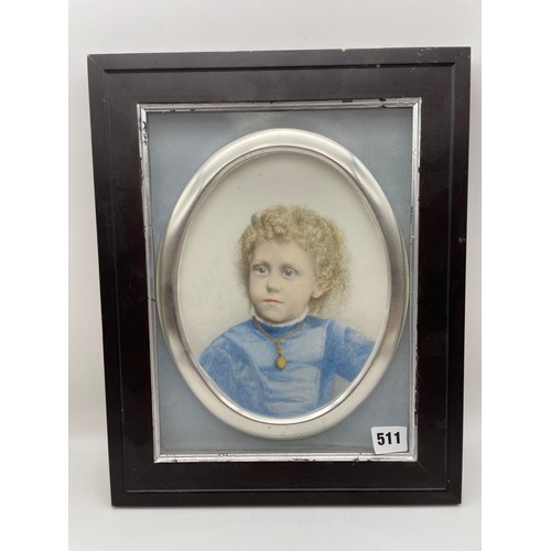 511 - EARLY 20TH CENTURY PORTRAIT ON OVAL PORCELAIN PLAQUE OF A YOUNG CHILD WEARING A BLUE COLLARED TOP AN... 