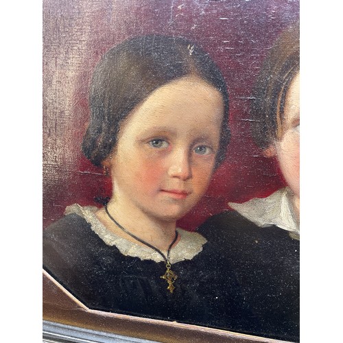 507 - 19TH CENTURY OIL ON OCTAGONAL CANVAS PORTRAIT STUDY OF A BROTHER AND SISTER, UNSIGNED IN ORNATE FRAM... 