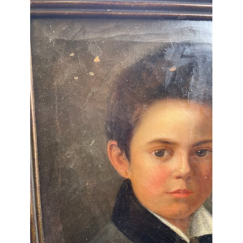 503 - 19TH CENTURY CONTINENTAL SCHOOL OIL ON CANVAS PORTRAIT OF A YOUNG BOY WEARING A BLACK COLLARED COAT,... 