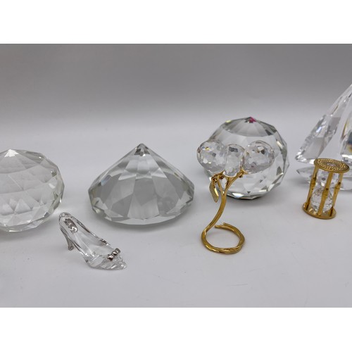 308A - GROUP OF SWAROVSKI FIGURES INC. BALLOON BUNCH, HOURGLASS, SHOE AND YACHT AND OTHER CRYSTAL SPHERES