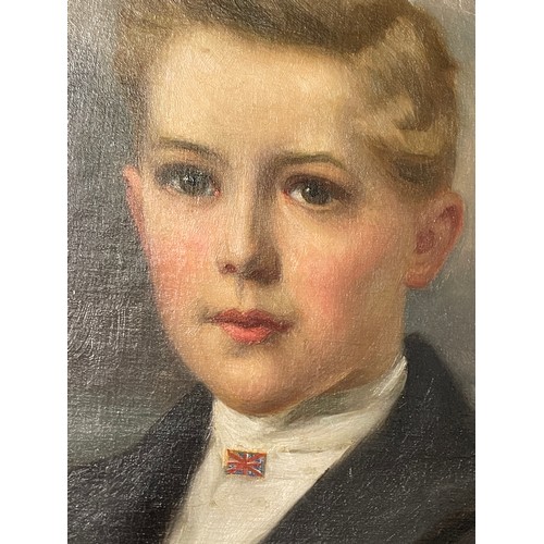 502 - EARLY 20TH CENTURY ENGLISH SCHOOL OIL ON CANVAS ENTITLED 'PORTRAIT OF A YOUNG BOY WEARING A SILK SCA... 