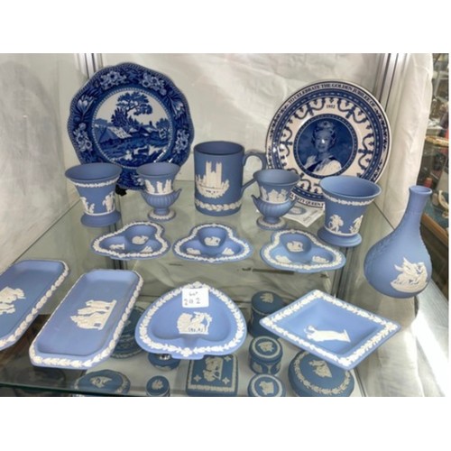 292 - TWO SHELVES OF WEDGWOOD POWDER BLUE JASPERWARE LIGHTERS, LIDDED JARS, SUIT TRAYS, TRINKET DISHES AND... 