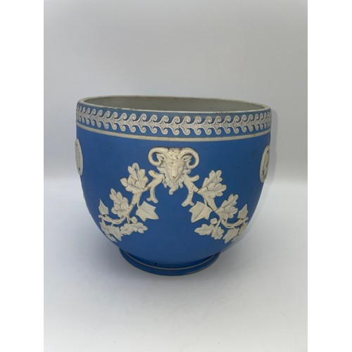 389 - POWDER BLUE JASPERWARE PLANTER DECORATED WITH RAMS HEADS AND OVAL CAMEOS