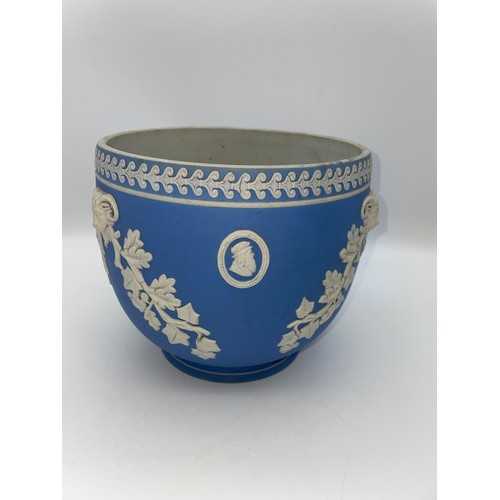 389 - POWDER BLUE JASPERWARE PLANTER DECORATED WITH RAMS HEADS AND OVAL CAMEOS