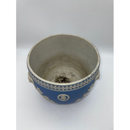 389 - POWDER BLUE JASPERWARE PLANTER DECORATED WITH RAMS HEADS AND OVAL CAMEOS