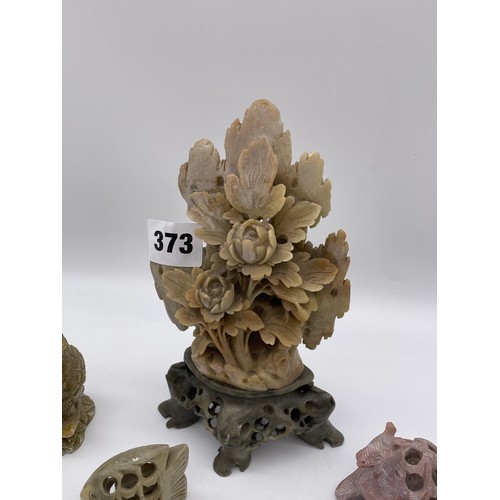 373 - ORIENTAL CARVED SOAP STONE FLOWER DISPLAY ON STAND AND SOME ANIMAL SOAP STONE CARVINGS