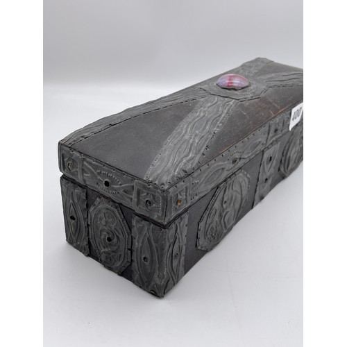 400 - ARTS AND CRAFTS OBLONG BOX WITH APPLIED PEWTER STRAP WORK AND WILLIAM MORRIS STYLE PANELS AND CABOCH... 