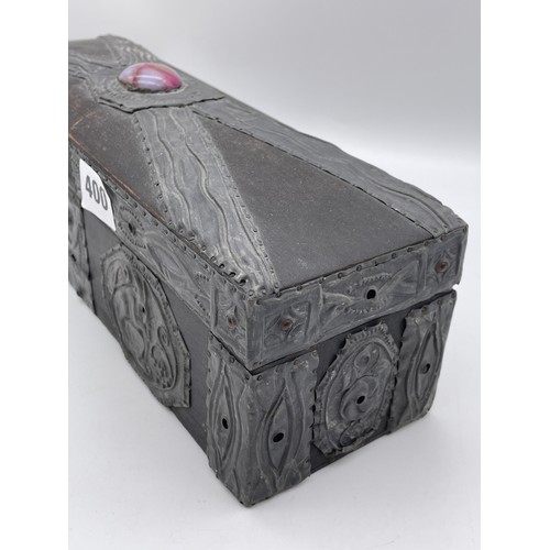 400 - ARTS AND CRAFTS OBLONG BOX WITH APPLIED PEWTER STRAP WORK AND WILLIAM MORRIS STYLE PANELS AND CABOCH... 