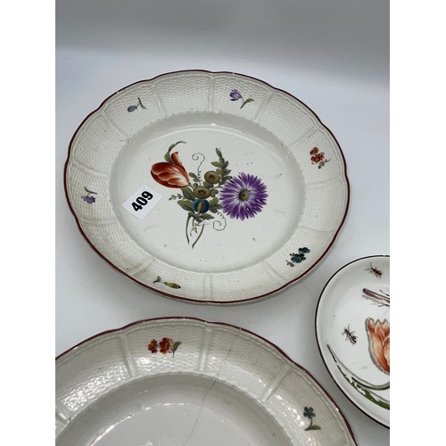 409 - TWO 18TH CENTURY LUDWIGSBURG BOTANICAL SPRAY BOWLS WITHIN LATTICE MOULDED BORDERS AND A MEISSEN SAUC... 