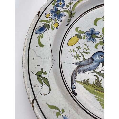 410 - 18TH CENTURY TIN GLAZED EARTHENWARE WALL CHARGER PAINTED IN COLOURS CENTRAL RESERVE POSSIBLY OF A WO... 