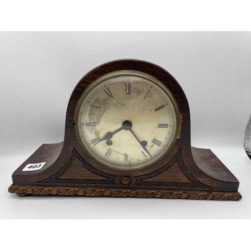 403 - JAMES WALKER LIMITED EIGHT DAY CHIMING OAK CASE MANTLE CLOCK