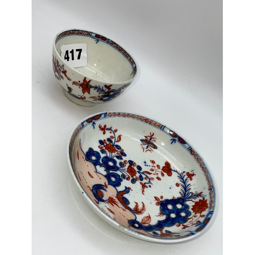 417 - 18TH CENTURY LOWESTOFT TEA BOWL AND SAUCER REDGRAVE PATTERN