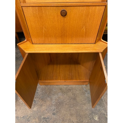 99 - 1960S TEAK TURNIDGE OF LONDON CORNER CABINET WITH DROP TRAY DOOR AND GLASS SHELVES