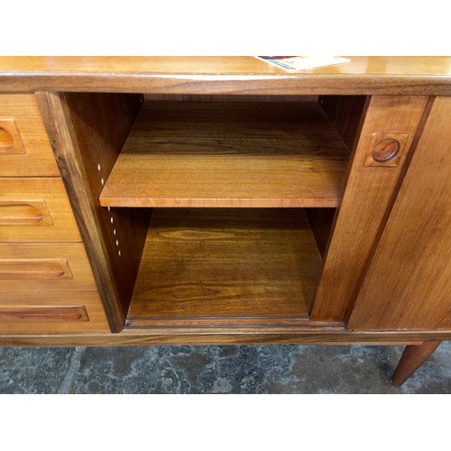 148 - 1960S DANISH TEAK DOUBLE DOOR LONG SIDEBOARD DESIGNED BY JOHANNES ANDERSEN FOR ULDUM MØBELFABRIK H 8... 