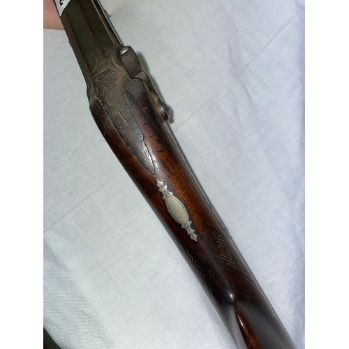 355 - 19TH CENTURY SINGLE BARRELLED CUSHION CAP RIFLE WITH ENGRAVED PLATE BY SMITH, WITH A WALNUT HATCHED ... 