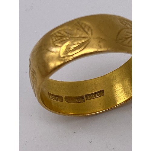 456 - 22CT GOLD ENGRAVED BROAD WEDDING BAND 11G APPROX SIZE T