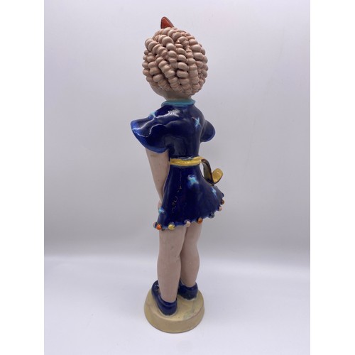 381 - GOLDSCHEIDER POTTERY FIGURE OF THE GIRL WITH RINGLETS IN A BLUE DRESS DESIGNED BY KURT GOEBEL 36cm