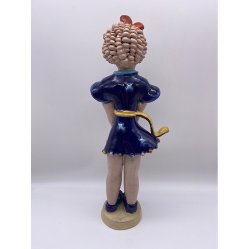 381 - GOLDSCHEIDER POTTERY FIGURE OF THE GIRL WITH RINGLETS IN A BLUE DRESS DESIGNED BY KURT GOEBEL 36cm