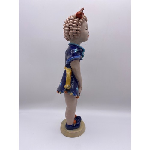 381 - GOLDSCHEIDER POTTERY FIGURE OF THE GIRL WITH RINGLETS IN A BLUE DRESS DESIGNED BY KURT GOEBEL 36cm