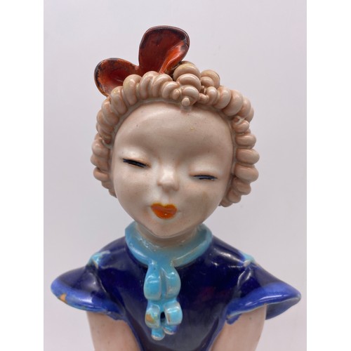 381 - GOLDSCHEIDER POTTERY FIGURE OF THE GIRL WITH RINGLETS IN A BLUE DRESS DESIGNED BY KURT GOEBEL 36cm