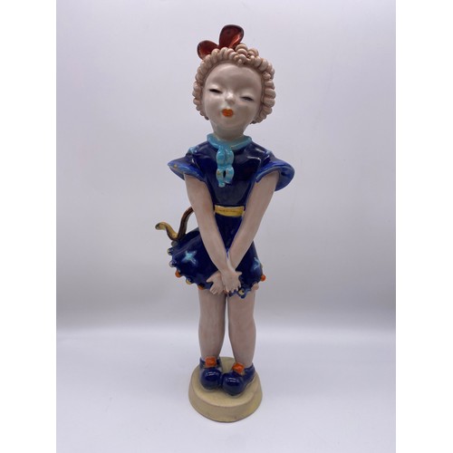 381 - GOLDSCHEIDER POTTERY FIGURE OF THE GIRL WITH RINGLETS IN A BLUE DRESS DESIGNED BY KURT GOEBEL 36cm