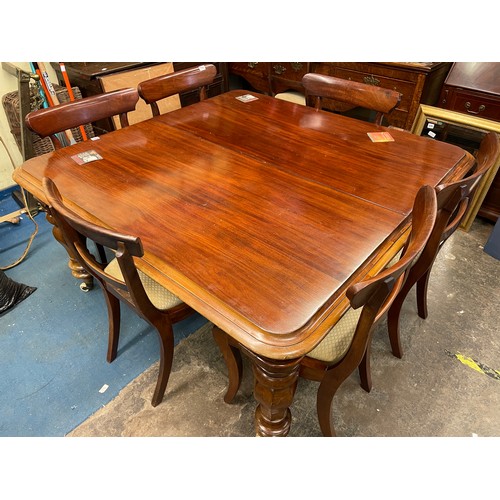 110 - EARLY VICTORIAN FLAME MAHOGANY EXTENDING DINING TABLE WITH MOULDED EDGE ON BULBOUS HEXAGONAL TAPERED... 