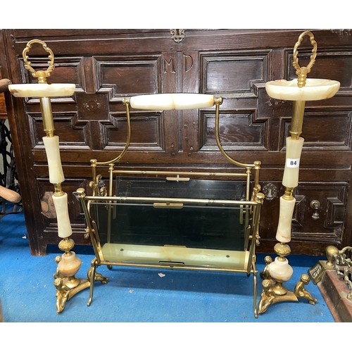 84 - PAIR OF ONYX PEDESTAL FIGURAL ASHTRAYS AND A BRASS AND GLAZED MAGAZINE RACK