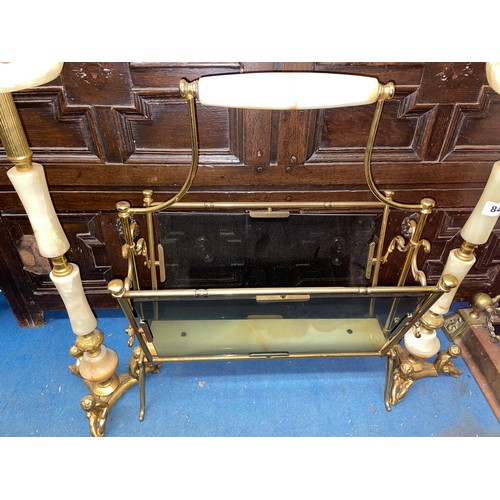 84 - PAIR OF ONYX PEDESTAL FIGURAL ASHTRAYS AND A BRASS AND GLAZED MAGAZINE RACK