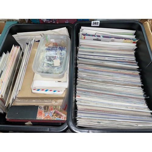 382 - TWO CARTONS OF GB FIRST DAY POSTAGE STAMP COVERS, STAMP ALBUM, AND A TUB OF LOOSE STAMPS