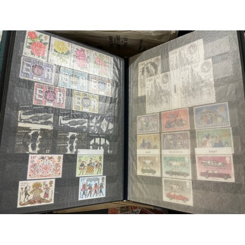 382 - TWO CARTONS OF GB FIRST DAY POSTAGE STAMP COVERS, STAMP ALBUM, AND A TUB OF LOOSE STAMPS