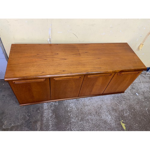 28 - 1970S TEAK FOUR CUPBOARD BASE UNIT H- 55cm W- 133cm D- 46cm