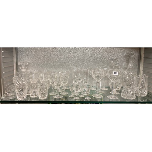 165 - TWO WATERFORD CRYSTAL DECANTERS, TALL WINE GLASSES, FLUTES AND OTHER GOOD QUALITY GLASSWARE AND TUMB... 