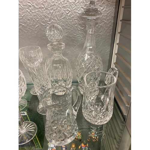 165 - TWO WATERFORD CRYSTAL DECANTERS, TALL WINE GLASSES, FLUTES AND OTHER GOOD QUALITY GLASSWARE AND TUMB... 