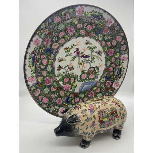 174 - CANTON FAMILLE ROSE WALL CHARGER AND A SMALLER PIG MONEY BANK