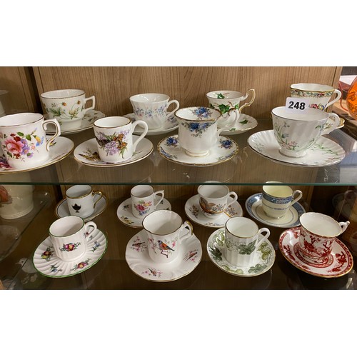 248 - TWO SHELVES OF BONE CHINA CABINET CUPS AND SAUCERS, ROYAL GRAFTON, SPODE, HAMMERSLEY AND OTHERS