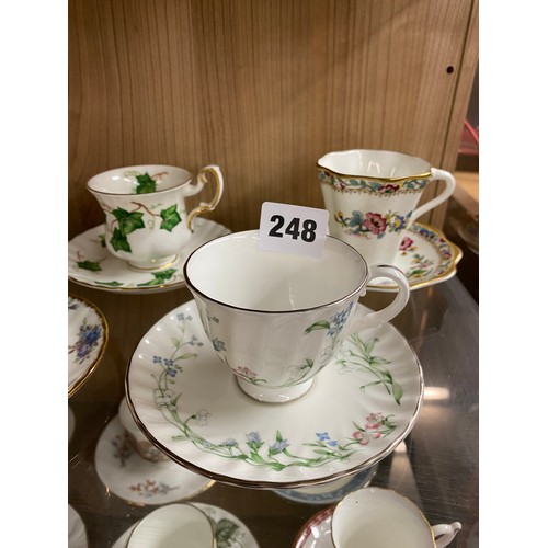 248 - TWO SHELVES OF BONE CHINA CABINET CUPS AND SAUCERS, ROYAL GRAFTON, SPODE, HAMMERSLEY AND OTHERS