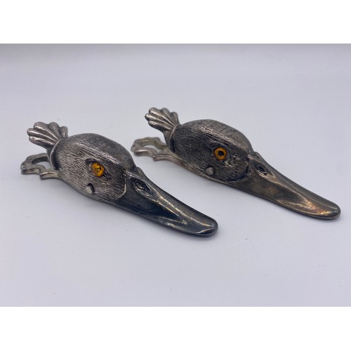 286 - PAIR OF 1920/30S PLATED DUCK HEAD OFFICE PAPER CLIP WITH AMBER EYES